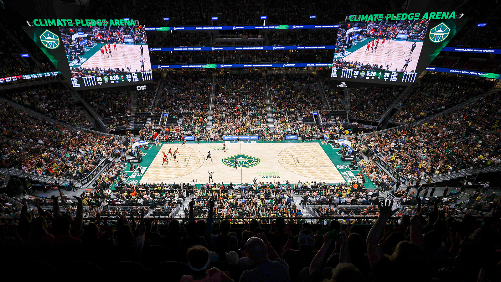 arena bowl with crowd looking at center court for a Storm game